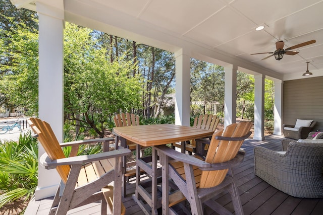 9 W Salt Box Ln, Watersound, FL 32461 - deck with outdoor dining space and a ceiling fan