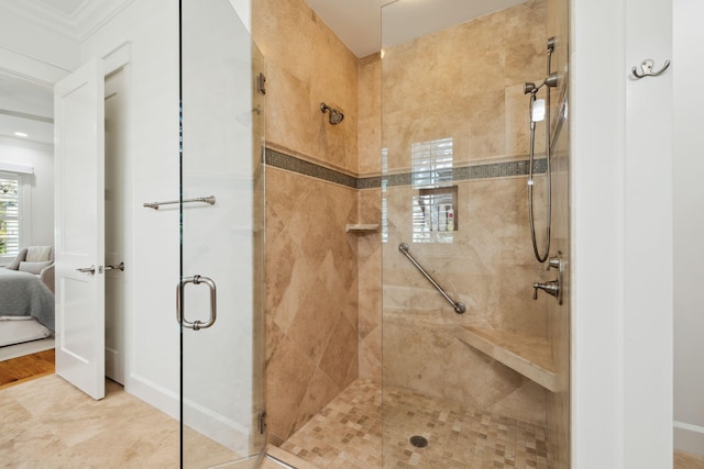 9 W Salt Box Ln, Watersound, FL 32461 - bathroom with a stall shower, ensuite bathroom, and ornamental molding