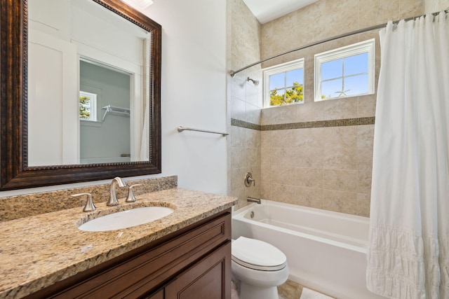 9 W Salt Box Ln, Watersound, FL 32461 - bathroom featuring healthy amount of natural light, vanity, and shower / tub combo