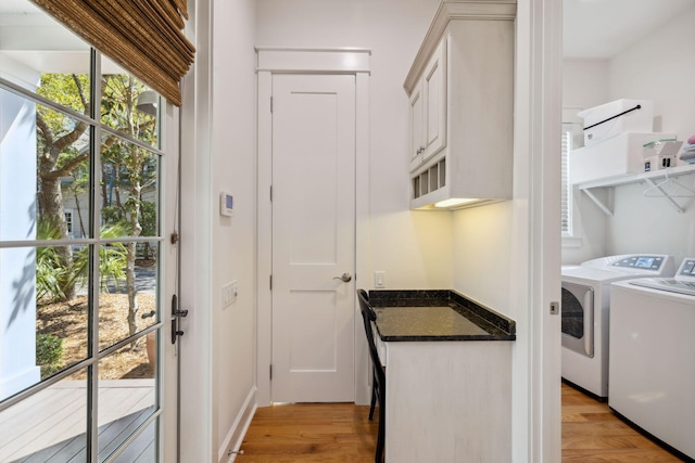 9 W Salt Box Ln, Watersound, FL 32461 - washroom featuring washer and dryer and light wood-style flooring