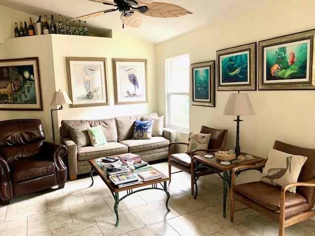 4643 Windstarr Dr, Destin, FL 32541 - living room featuring ceiling fan and lofted ceiling