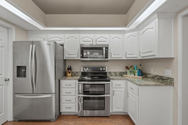 3228 Mcmillan Creek Dr, Milton, FL 32583 - kitchen with appliances with stainless steel finishes and white cabinets