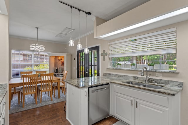 3228 Mcmillan Creek Dr, Milton, FL 32583 - kitchen featuring dishwasher, dark wood-style floors, white cabinetry, a chandelier, and healthy amount of natural light