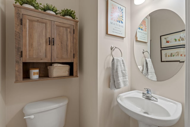 3228 Mcmillan Creek Dr, Milton, FL 32583 - half bath featuring a sink and toilet