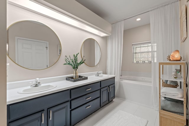 3228 Mcmillan Creek Dr, Milton, FL 32583 - full bath featuring double vanity, a bath, tile patterned floors, and recessed lighting