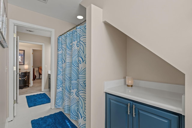 3228 Mcmillan Creek Dr, Milton, FL 32583 - bathroom featuring tile patterned floors, ensuite bathroom, and a shower with curtain