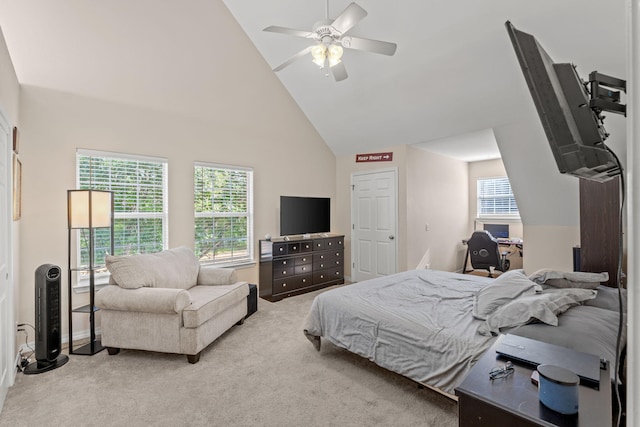3228 Mcmillan Creek Dr, Milton, FL 32583 - bedroom with light colored carpet, high vaulted ceiling, and ceiling fan
