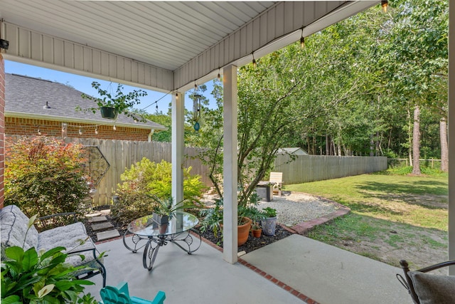 3228 Mcmillan Creek Dr, Milton, FL 32583 - fenced backyard with a patio