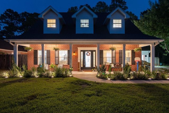 3228 Mcmillan Creek Dr, Milton, FL 32583 - view of front of house featuring a porch and brick siding
