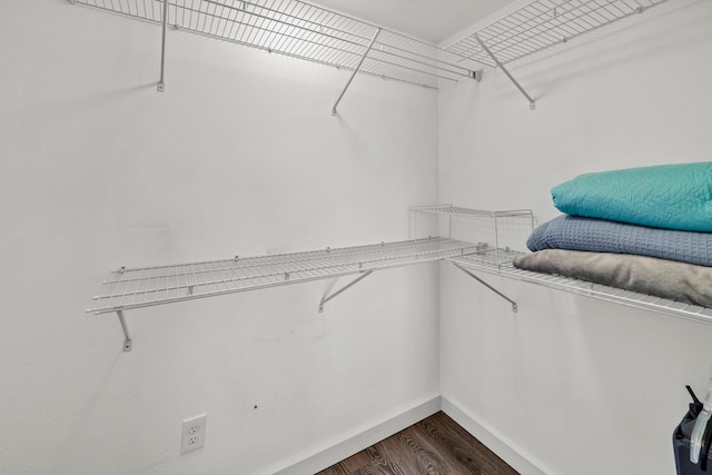 115 Gulf Winds Ct Unit 2, Destin, FL 32541 - spacious closet with dark wood-style floors