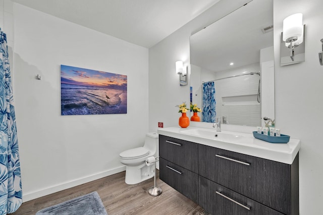 115 Gulf Winds Ct Unit 2, Destin, FL 32541 - full bathroom featuring wood finished floors, vanity, and a shower with shower curtain