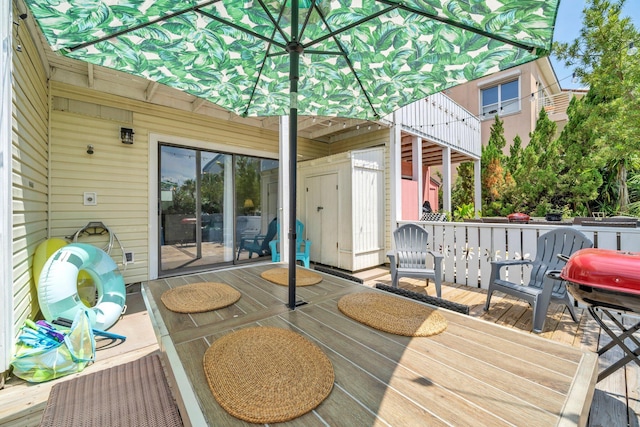 115 Gulf Winds Ct Unit 2, Destin, FL 32541 - wooden terrace featuring a grill