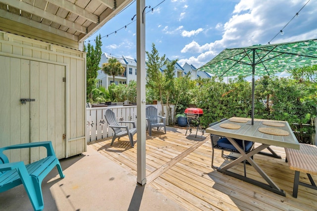 115 Gulf Winds Ct Unit 2, Destin, FL 32541 - wooden terrace featuring outdoor dining area