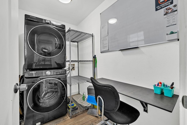 115 Gulf Winds Ct Unit 2, Destin, FL 32541 - laundry area with stacked washer and clothes dryer, wood finished floors, and an office area