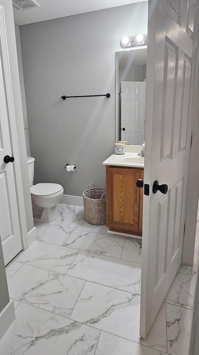 4906 Laurel Oak Dr, Pace, FL 32571 - half bath with marble finish flooring and vanity