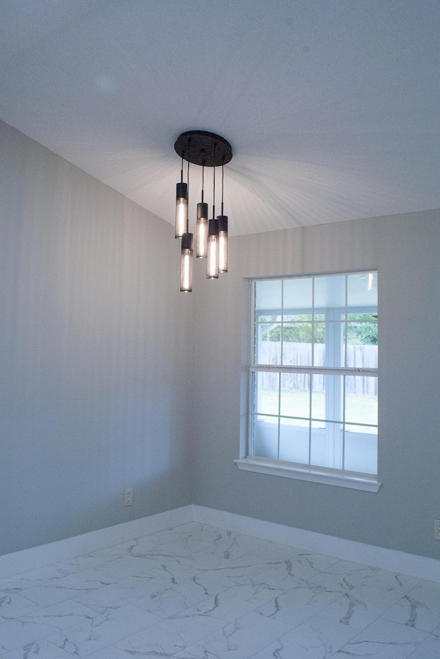 4906 Laurel Oak Dr, Pace, FL 32571 - spare room with baseboards and marble look tiles
