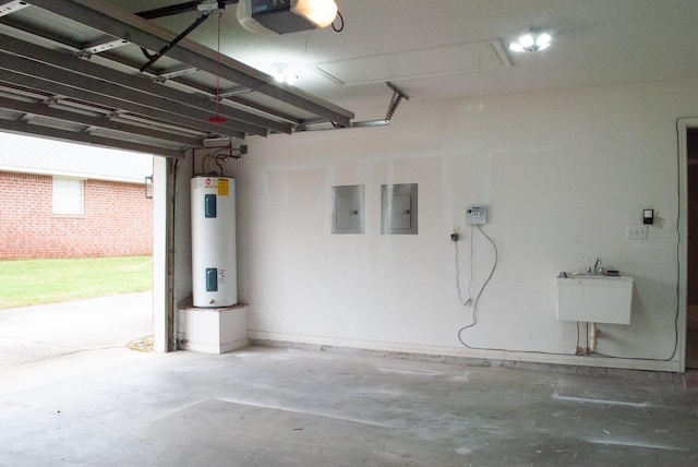 4906 Laurel Oak Dr, Pace, FL 32571 - garage featuring water heater, a garage door opener, and electric panel