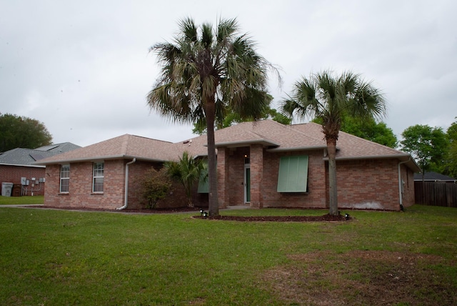 4906 Laurel Oak Dr, Pace, FL 32571 - ranch-style house with brick siding and a shingled roof