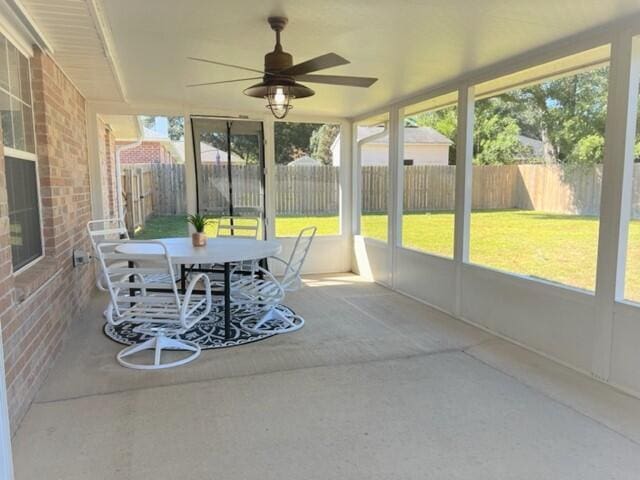 4906 Laurel Oak Dr, Pace, FL 32571 - sunroom / solarium featuring outdoor dining area, ceiling fan, and plenty of natural light