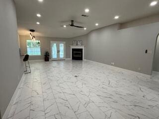 4906 Laurel Oak Dr, Pace, FL 32571 - unfurnished living room featuring recessed lighting, marble look tiles, ceiling fan, and a fireplace