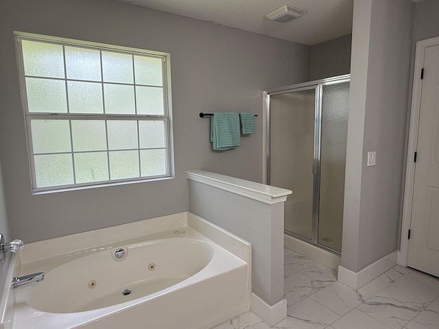 4906 Laurel Oak Dr, Pace, FL 32571 - full bath featuring marble finish floors, a stall shower, and a whirlpool tub