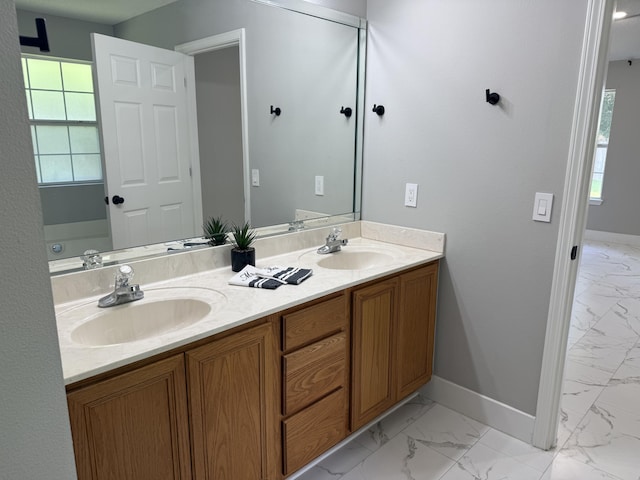 4906 Laurel Oak Dr, Pace, FL 32571 - full bath featuring marble finish flooring and double vanity