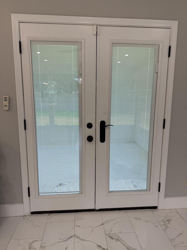 4906 Laurel Oak Dr, Pace, FL 32571 - doorway to outside featuring marble finish floors and french doors
