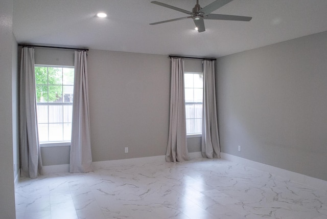 4906 Laurel Oak Dr, Pace, FL 32571 - empty room featuring ceiling fan, recessed lighting, and marble finish floors