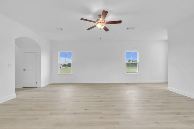 785 Alleyoak Ln Lot 86-1, Freeport, FL 32439 - empty room with plenty of natural light, a ceiling fan, and light wood-style floors