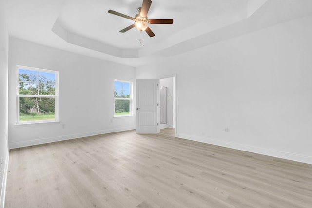 785 Alleyoak Ln Lot 86-1, Freeport, FL 32439 - spare room with a raised ceiling, light wood-style flooring, and ceiling fan