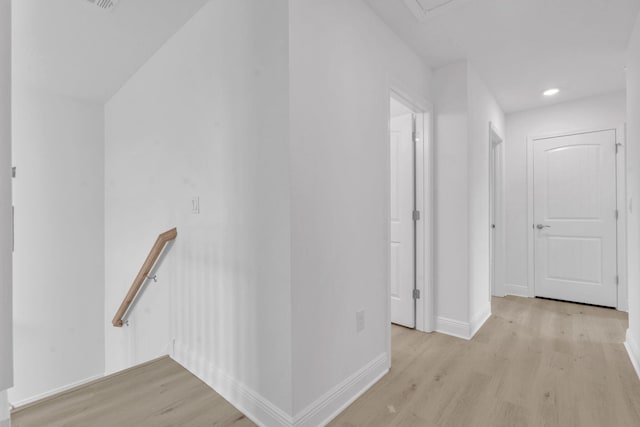 785 Alleyoak Ln Lot 86-1, Freeport, FL 32439 - hallway featuring light wood-style flooring, an upstairs landing, and recessed lighting