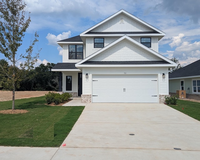 785 Alleyoak Ln Lot 86-1, Freeport, FL 32439 - view of front facade with driveway, a front lawn, stone siding, and board and batten siding