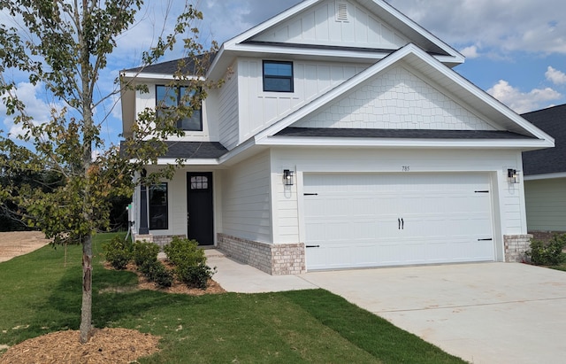 785 Alleyoak Ln Lot 86-1, Freeport, FL 32439 - craftsman inspired home featuring board and batten siding, concrete driveway, a front lawn, and a shingled roof