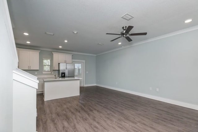 151 N Sand Palm Rd Unit 151, Freeport, FL 32439 - kitchen with stainless steel refrigerator with ice dispenser, ornamental molding, open floor plan, an island with sink, and recessed lighting