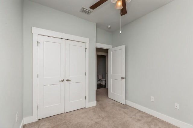 151 N Sand Palm Rd Unit 151, Freeport, FL 32439 - unfurnished bedroom featuring light carpet, a closet, and a ceiling fan
