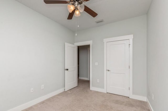 151 N Sand Palm Rd Unit 151, Freeport, FL 32439 - unfurnished bedroom with light carpet and ceiling fan
