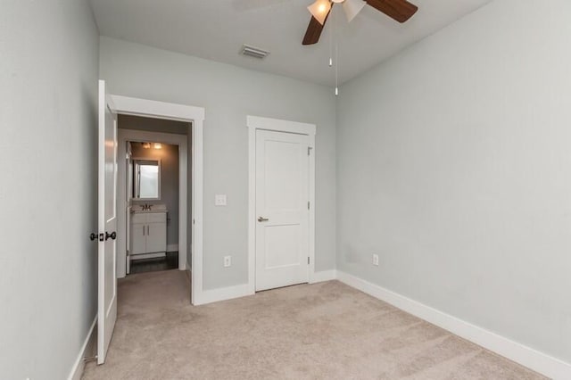 151 N Sand Palm Rd Unit 151, Freeport, FL 32439 - unfurnished bedroom with light colored carpet and a ceiling fan