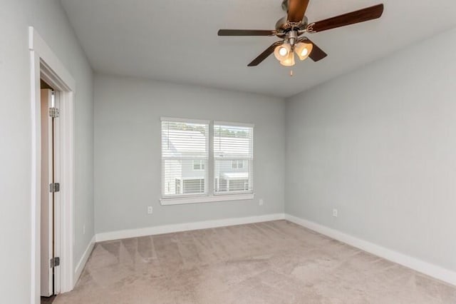 151 N Sand Palm Rd Unit 151, Freeport, FL 32439 - carpeted spare room with baseboards and ceiling fan