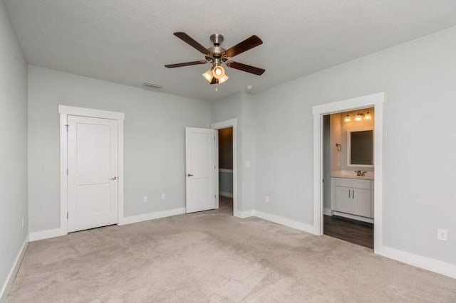 151 N Sand Palm Rd Unit 151, Freeport, FL 32439 - unfurnished bedroom with carpet flooring, ensuite bath, and a ceiling fan