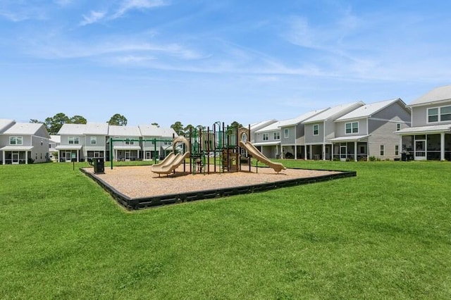 151 N Sand Palm Rd Unit 151, Freeport, FL 32439 - community playground featuring a residential view and a lawn