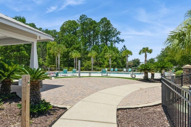 151 N Sand Palm Rd Unit 151, Freeport, FL 32439 - view of home's community with a pool and a patio area