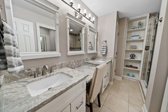 72 Vantage Pt, Miramar Beach, FL 32550 - full bathroom featuring double vanity, tile patterned floors, and a stall shower