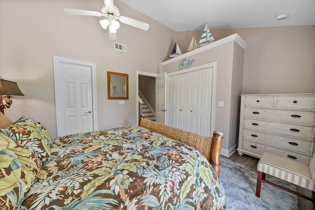 72 Vantage Pt, Miramar Beach, FL 32550 - bedroom with a closet, dark wood-style flooring, a ceiling fan, and high vaulted ceiling