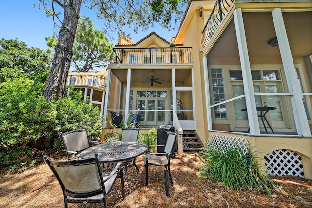 72 Vantage Pt, Miramar Beach, FL 32550 - back of house with a balcony and outdoor dining area