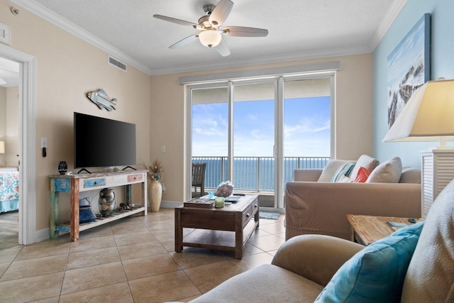 17643 Front Beach Rd Unit 1905, Panama City Beach, FL 32413 - tiled living area with ceiling fan, ornamental molding, and a textured ceiling