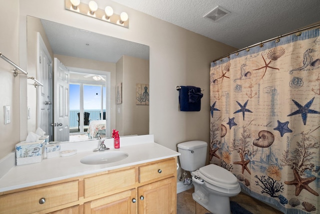 17643 Front Beach Rd Unit 1905, Panama City Beach, FL 32413 - full bath featuring vanity, a textured ceiling, tile patterned flooring, and a shower with shower curtain