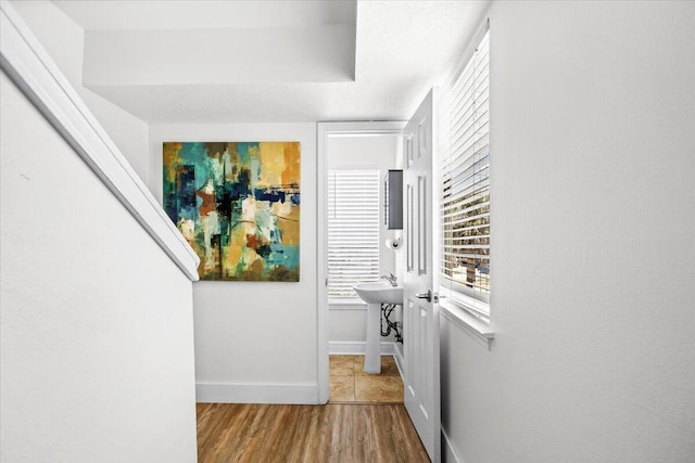 926 Whelk Ct Unit C, Fort Walton Beach, FL 32548 - hall featuring baseboards and wood finished floors