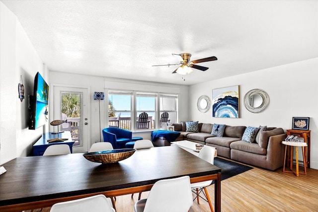 926 Whelk Ct Unit C, Fort Walton Beach, FL 32548 - living room featuring a ceiling fan, light wood-style floors, and a textured ceiling