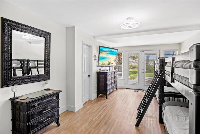 926 Whelk Ct Unit C, Fort Walton Beach, FL 32548 - bedroom featuring access to outside, wood finished floors, and french doors