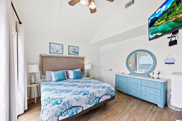 926 Whelk Ct Unit C, Fort Walton Beach, FL 32548 - bedroom with light wood-type flooring, ceiling fan, and high vaulted ceiling